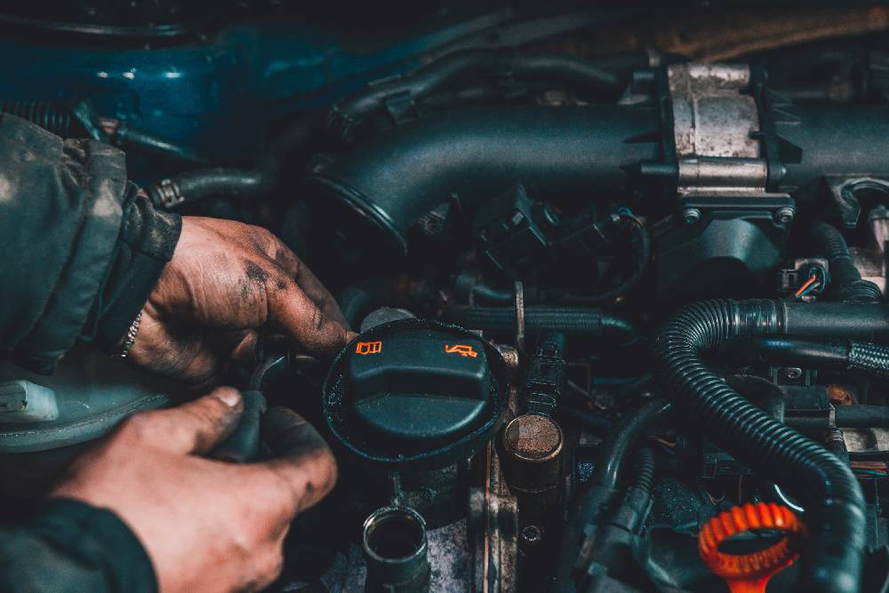 Tune-Ups the master repairs the engine in the car service during a malfunction